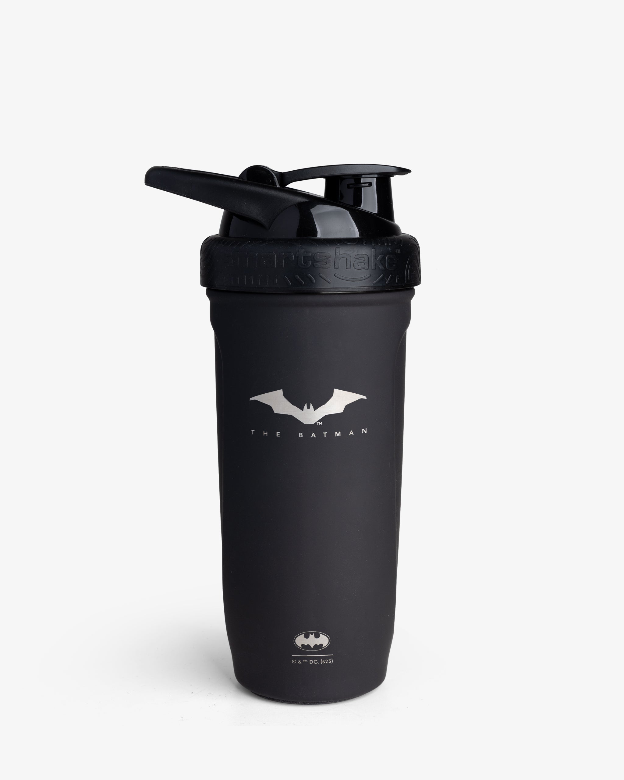 A black stainless steel shaker bottle with a Batman logo on it, equipped with a flip-top lid and measurement markings inside.