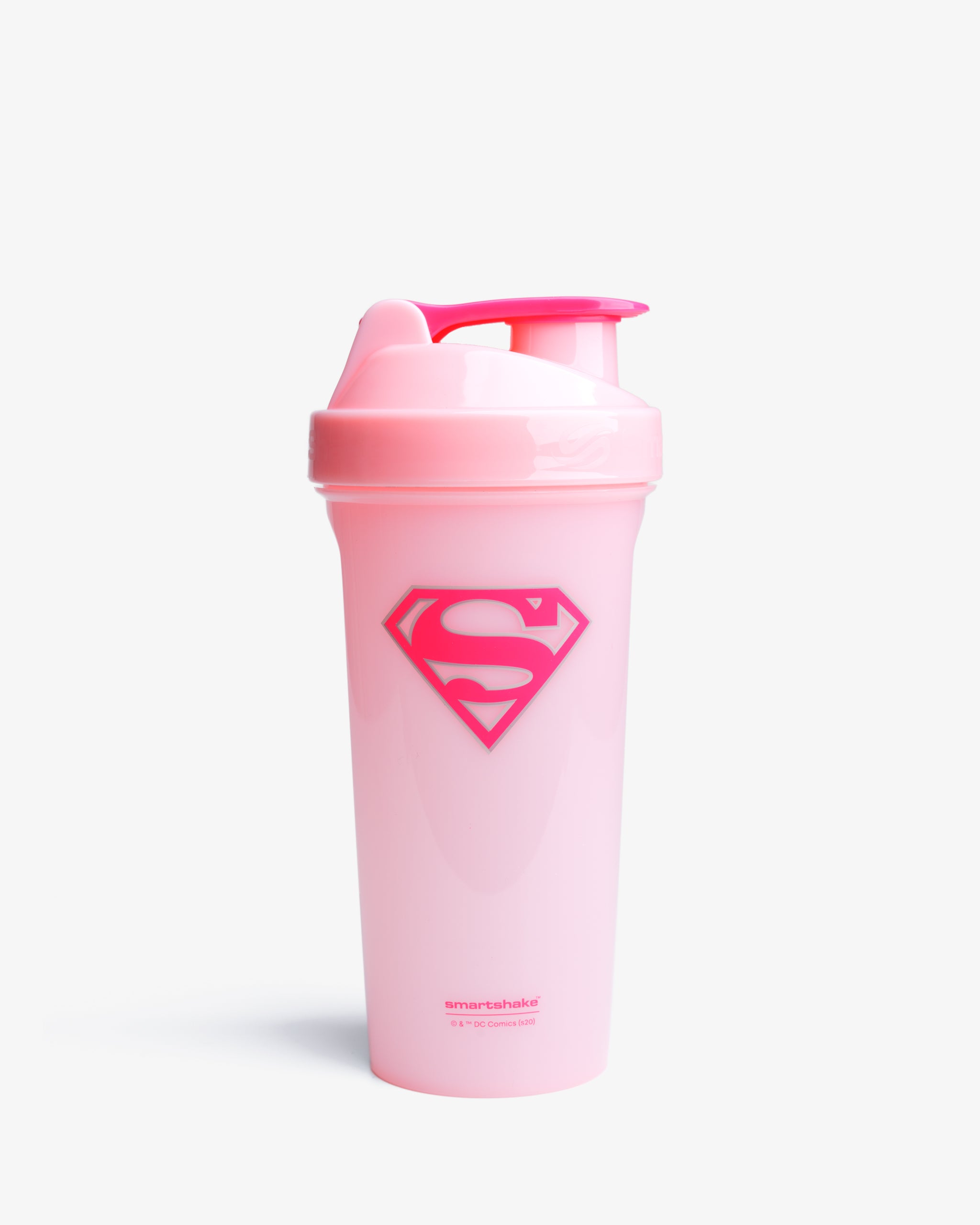 A pink shaker bottle with a red supergirl logo on it.