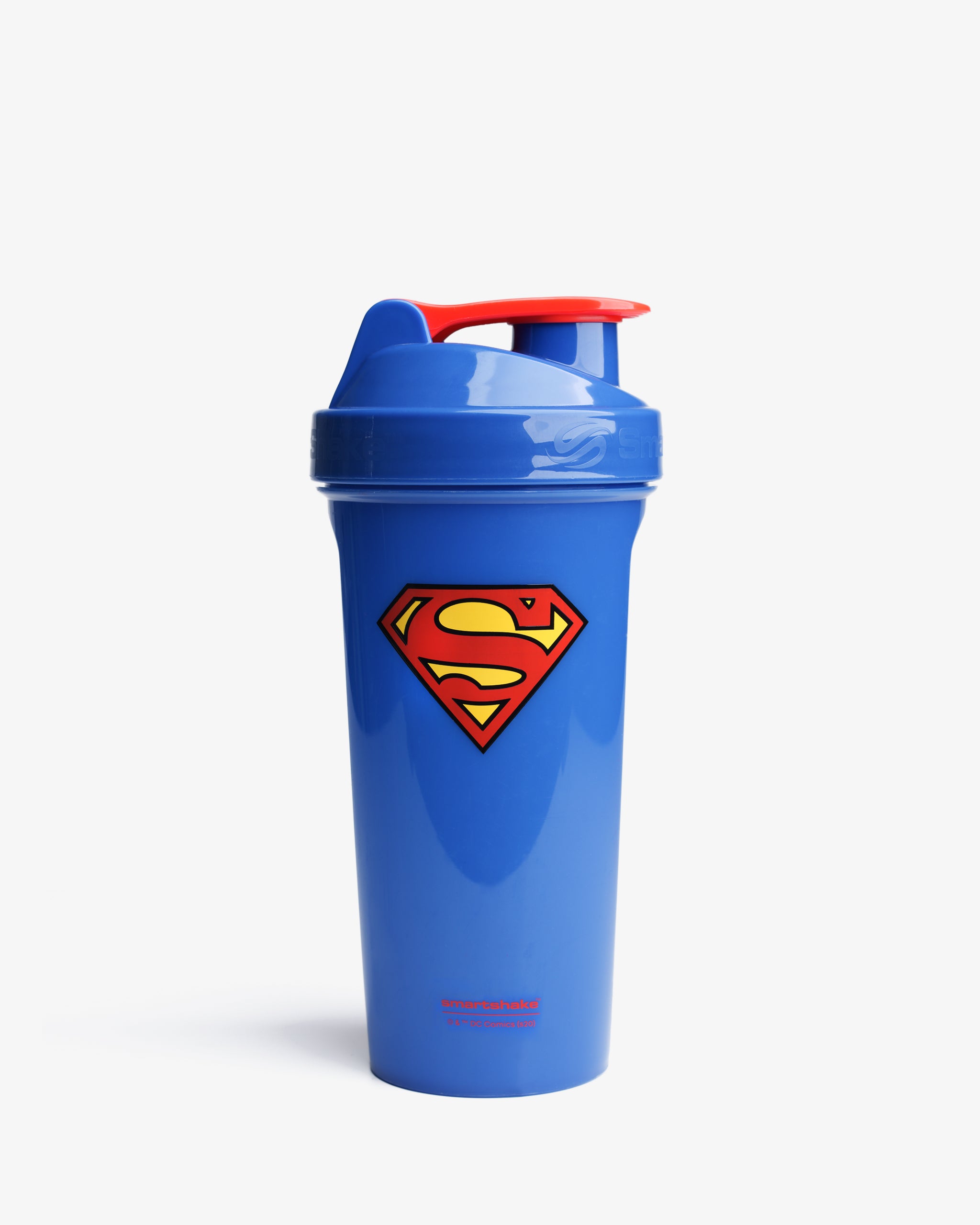 A blue shaker bottle with a red lid and a Superman logo on the front.